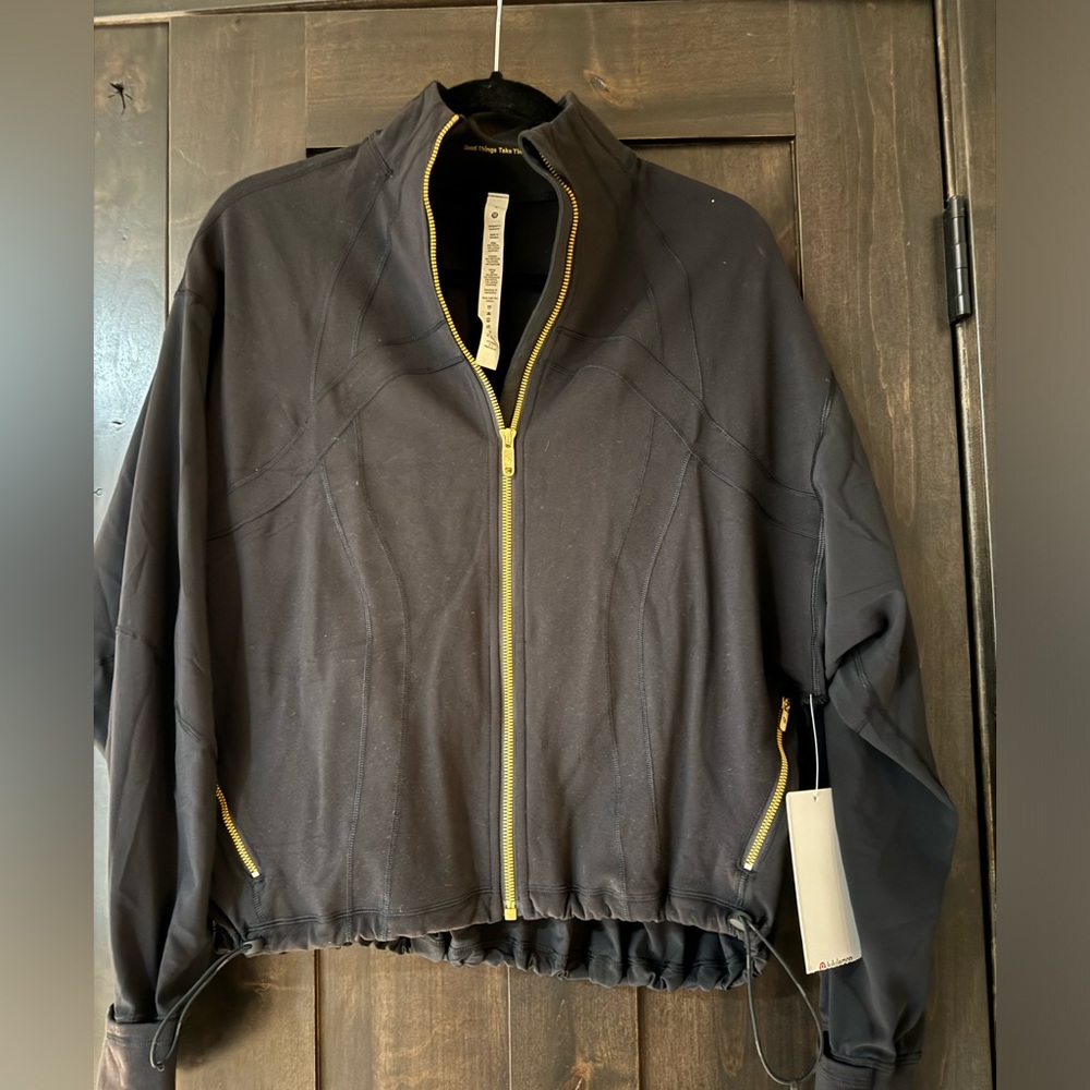 Lululemon Define relaxed fit jacket. Black with gold zipper so cute size 4